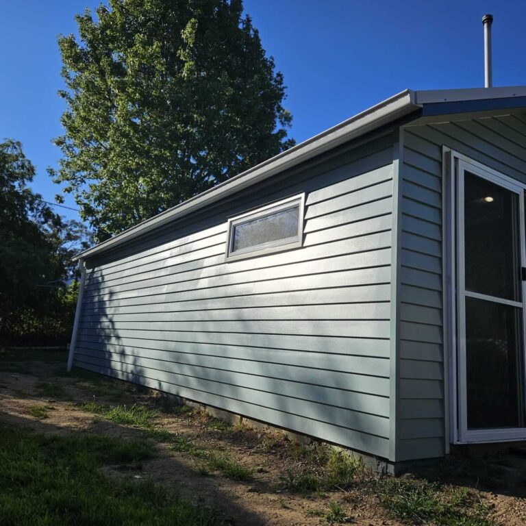 Old fibro garage in Springwood rebuilt as a weatherboard teenagers retreat