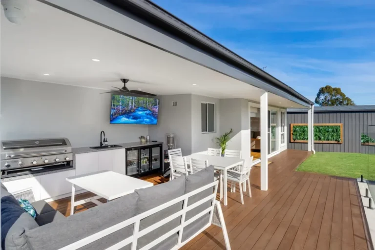Covered outdoor entertaining area with an outdoor kitchen