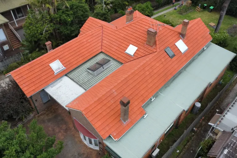 New terracotta tile roof with skylights on a home in Epping