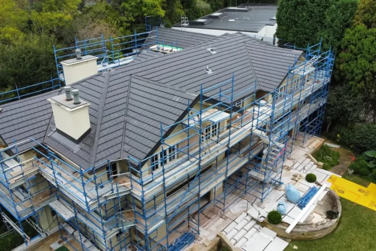 Charcoal tile reroof on a large two-storey home in Pymble