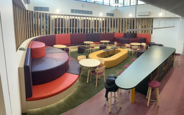 Curved bench and booth joinery in a school space at Meriden, Strathfield